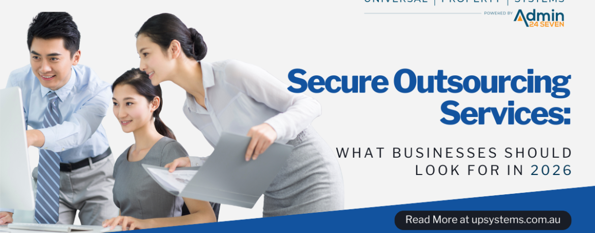 Business professionals reviewing work together, representing secure outsourcing services by Universal Property Systems for 2026.
